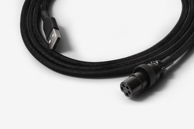 close up of akb black coiled mechanical keyboard cable