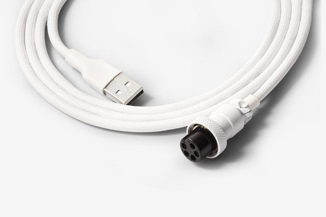 close up of akb white coiled mechanical keyboard cable