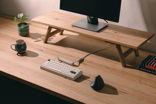 full desk view of white mechanical keyboard